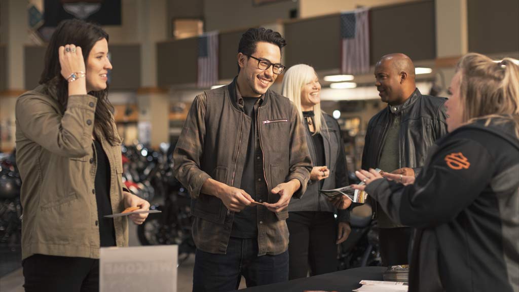 Customers at a Harley-Davidson dealership